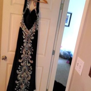 Tony bowls beautiful beaded gown